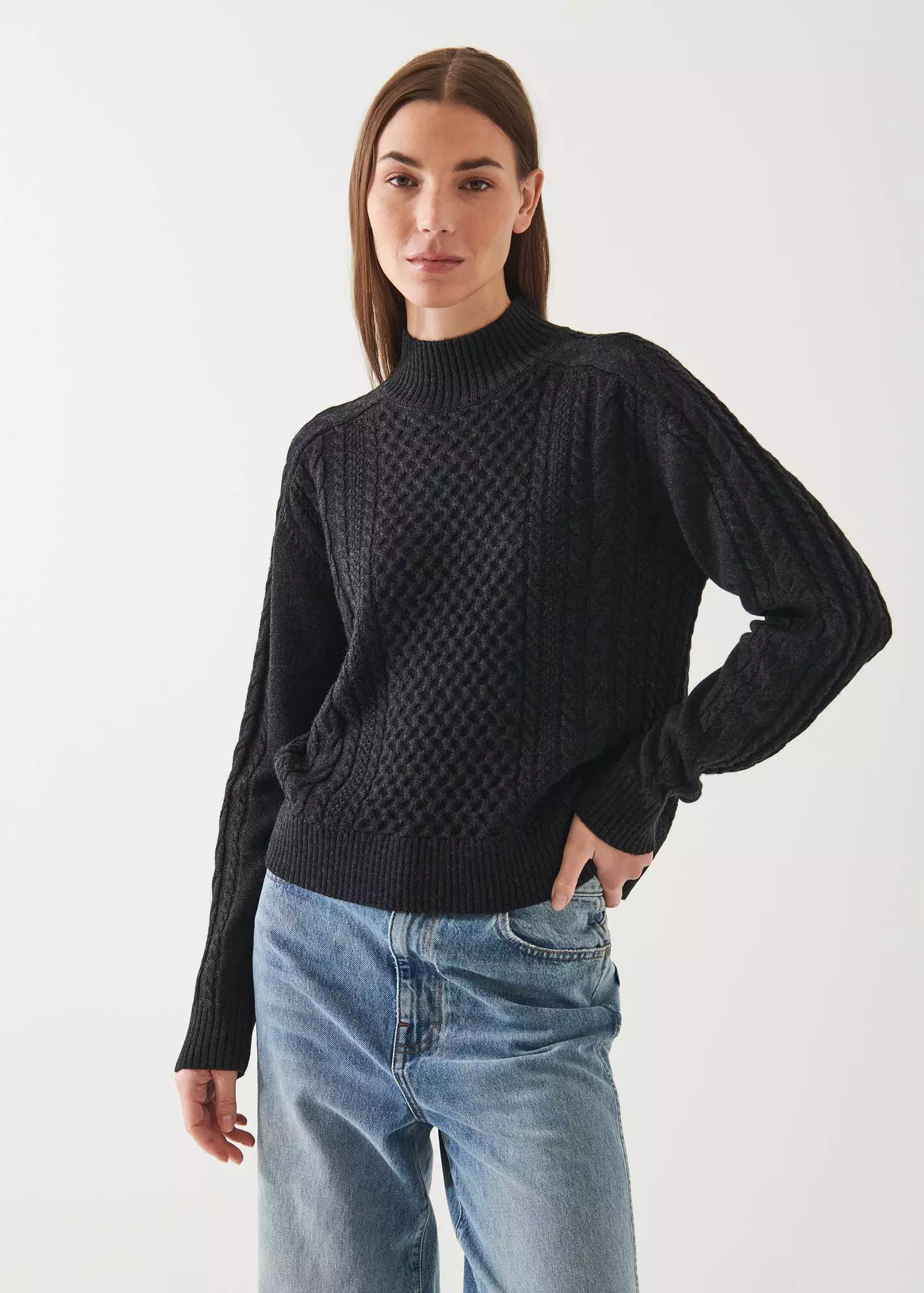 CABLE KNIT MOCK NECK SWEATER